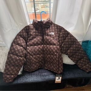 The North Face Brown monogram All-Over Logo Puffer Jacket 700 down retro nupse